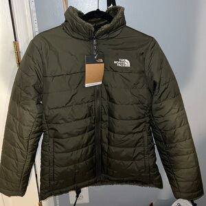 A reversible olive green North Face